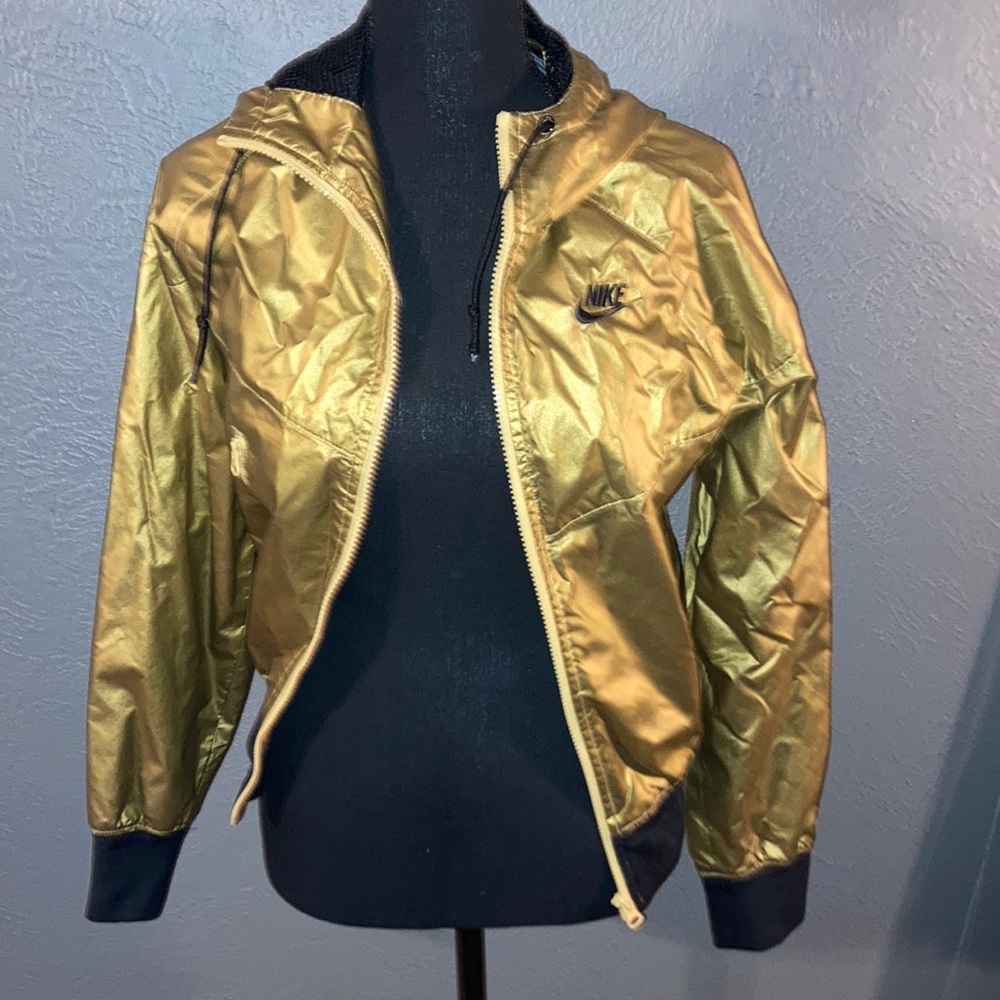 Women gold 3xs Nike jacket.